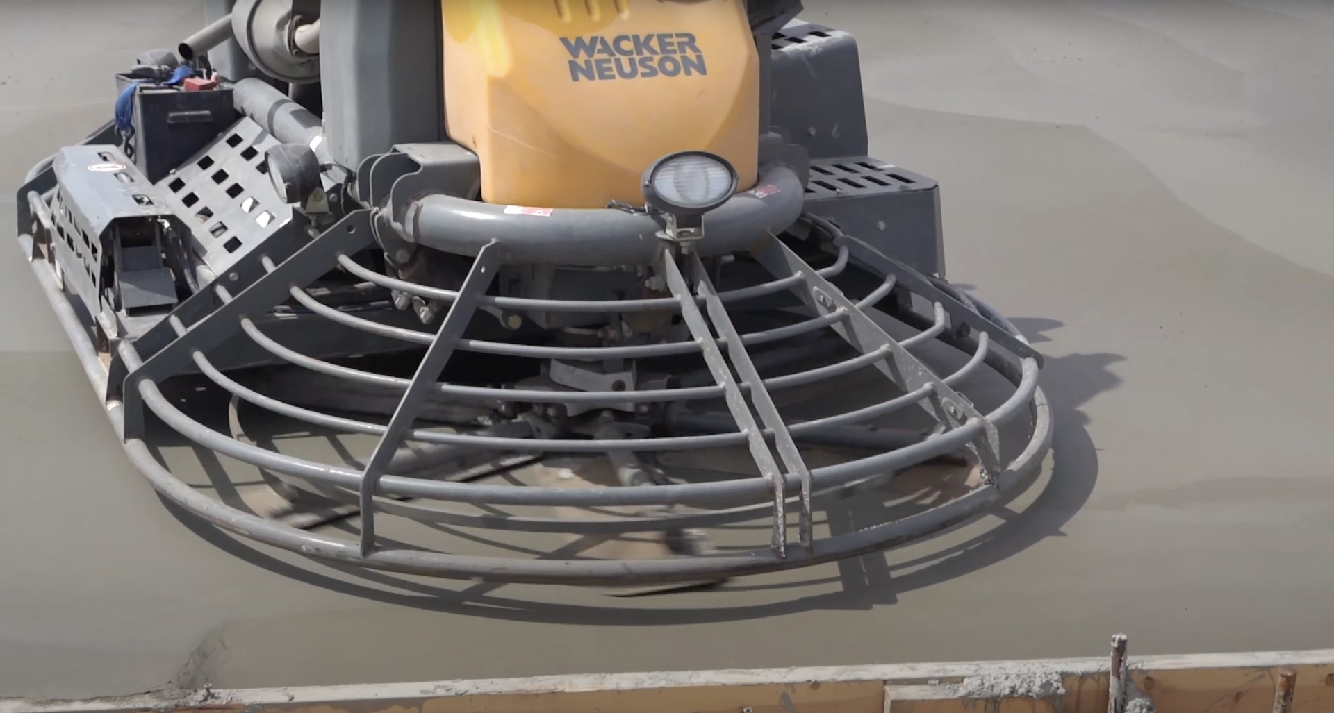 Professional concrete finishing equipment used by RegalCrest Kent Concrete Professional concrete finishing equipment including power trowel for smooth concrete surfaces