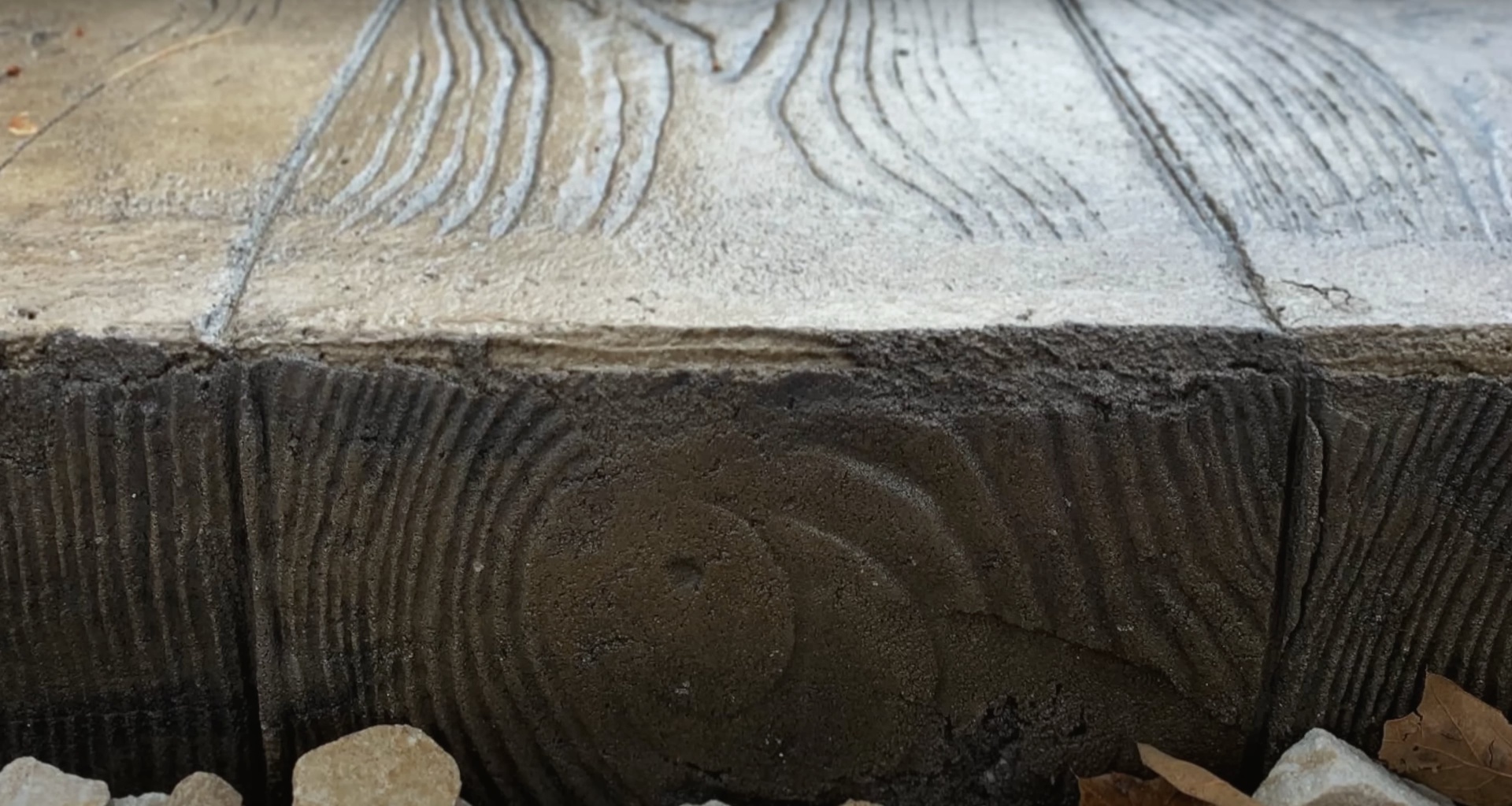 Expert concrete foundation work with professional finishing by RegalCrest Kent Concrete Concrete foundation edge showing professional concrete finishing and texturing work