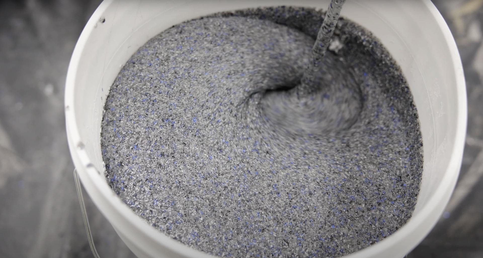 High-quality concrete mix preparation by RegalCrest Kent Concrete Close-up view of fresh concrete mix showing proper consistency and texture